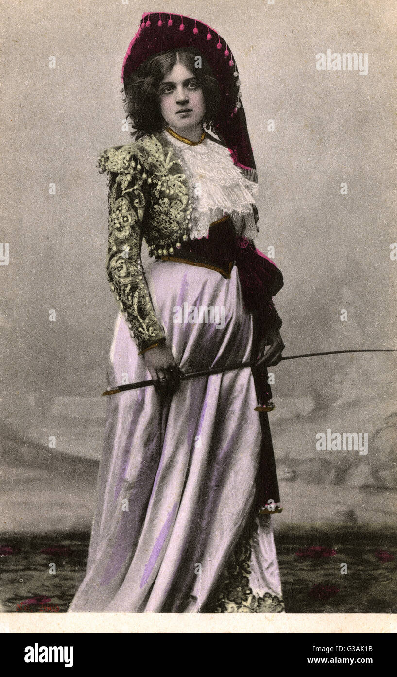 Severe-looking Iberian Woman holding riding crop.     Date: circa 1905 Stock Photo