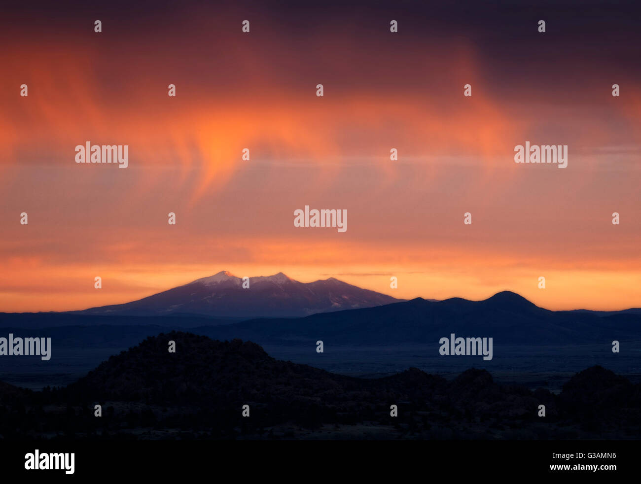 The San Francisco peaks over Prescott's Granite Dells and Chino Valley.  Arizona Stock Photo