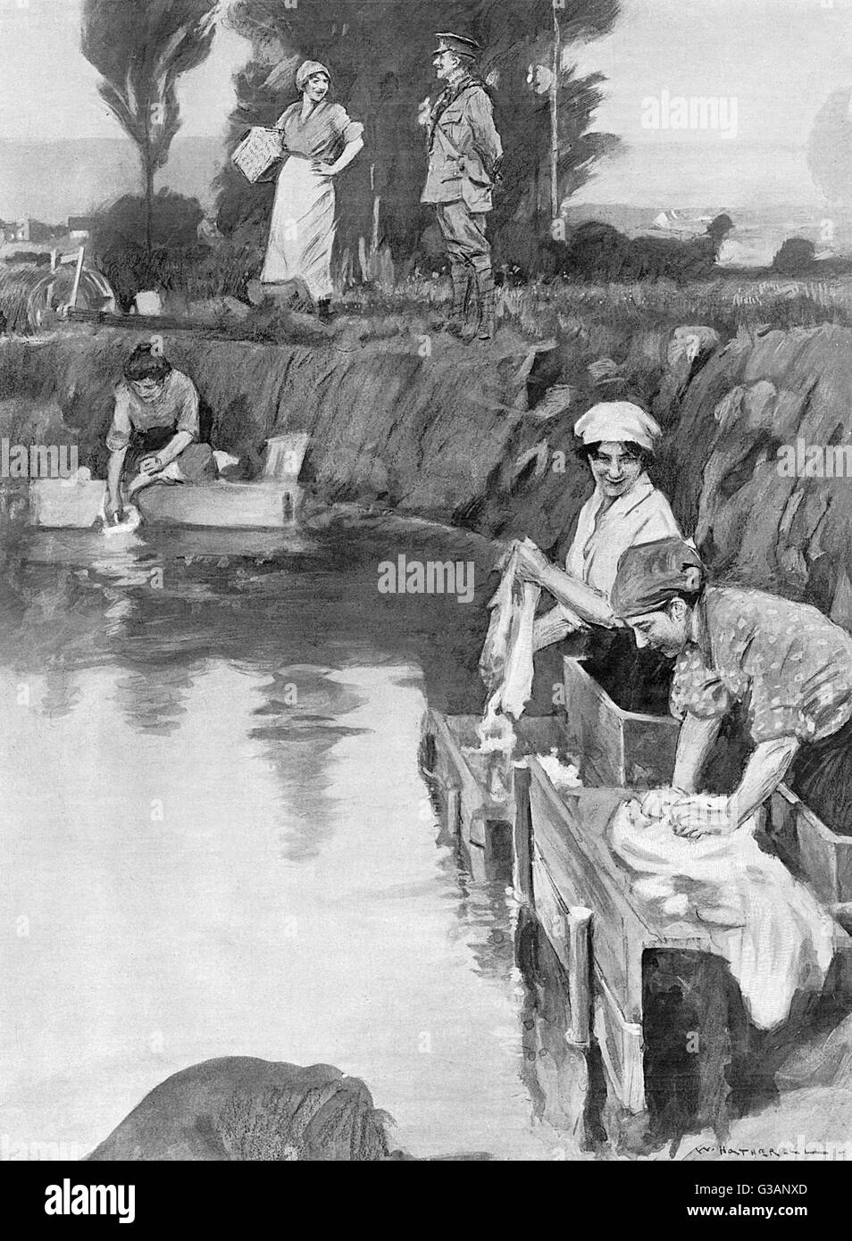 Using a shell hole as a wash-tub , WW1 Stock Photo
