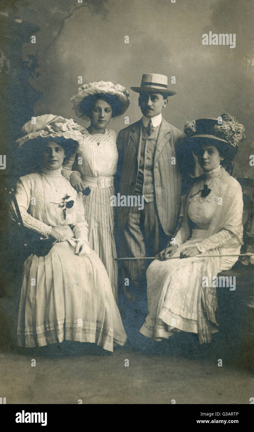 German family group in a studio portrait -- a man and three women, all in their smartest clothes.      Date: early 20th century Stock Photo