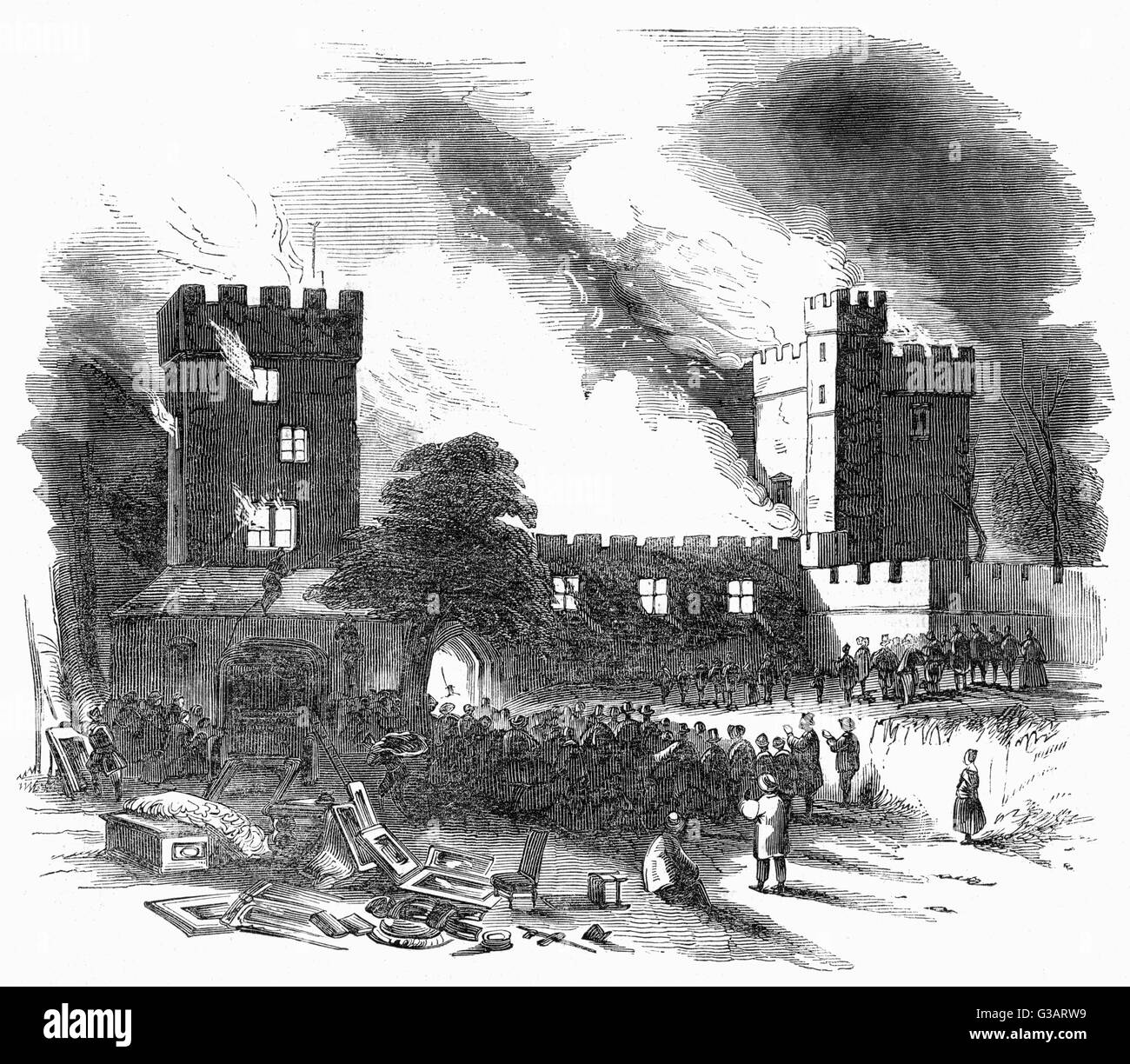 Devastating fire at Naworth Castle in Cumbria, England. The fire destroyed virtually all of the Castle, including the old dungeons in the West Wing. Only the top rooms of Lord Williams Tower, (his bedchamber, private library and chapel) survived.       Da Stock Photo