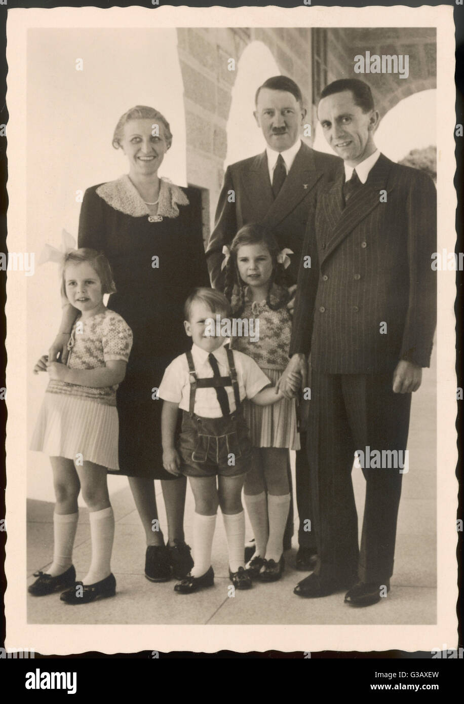 He poses with Goebbels, his  wife Magda, and three of their  children (they had three more)  all of whom died in the  Fuhrerbunker, April 1945      Date: 1930s Stock Photo