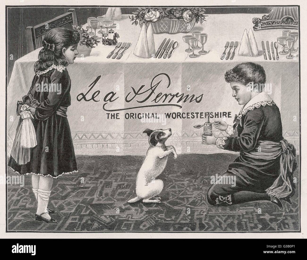 Two children tempt a small dog  with a spoon of Lea &amp; Perrins  Original Worcestershire Sauce.        Date: 1904 Stock Photo