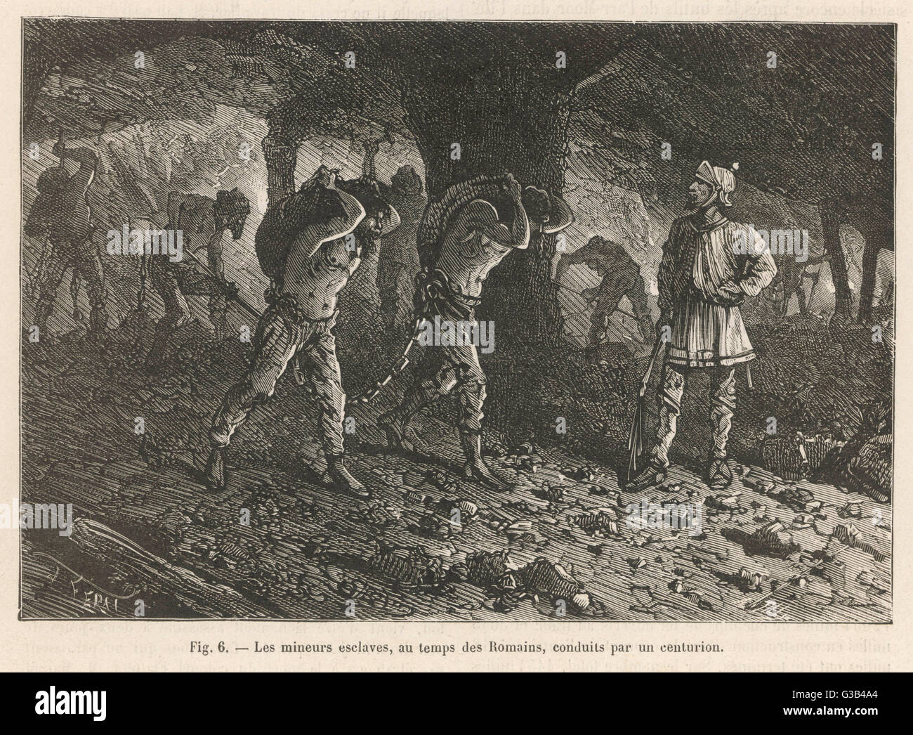 A Roman centurion supervises  Gaul slaves, chained together  and forced to work in the coal  mines. Stock Photo