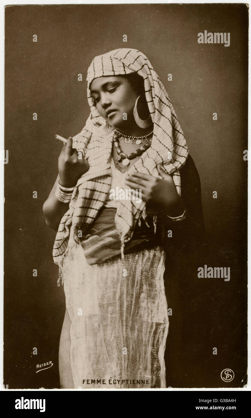 EGYPTIAN LADY SMOKES Stock Photo