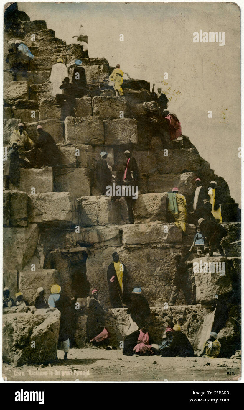 CLIMBING THE PYRAMIDS Stock Photo - Alamy