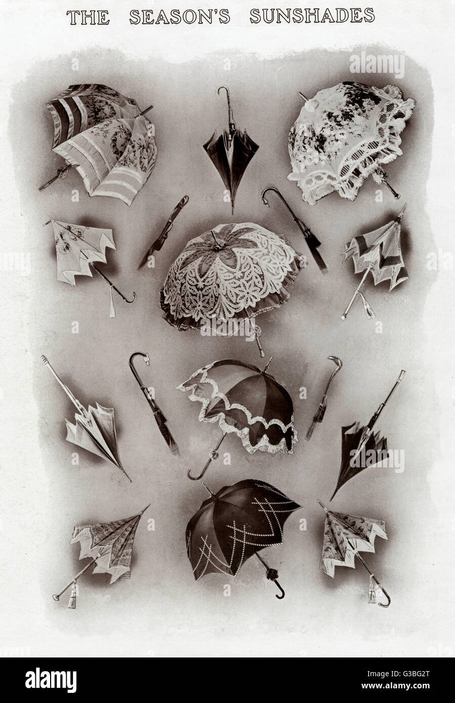 A selection of the season's  sunshades: ornamented with a  profusion of lace, ruched  braid, tassels &amp; floral  prints. Some handles are  shaped like bird's heads.     Date: 1909 Stock Photo