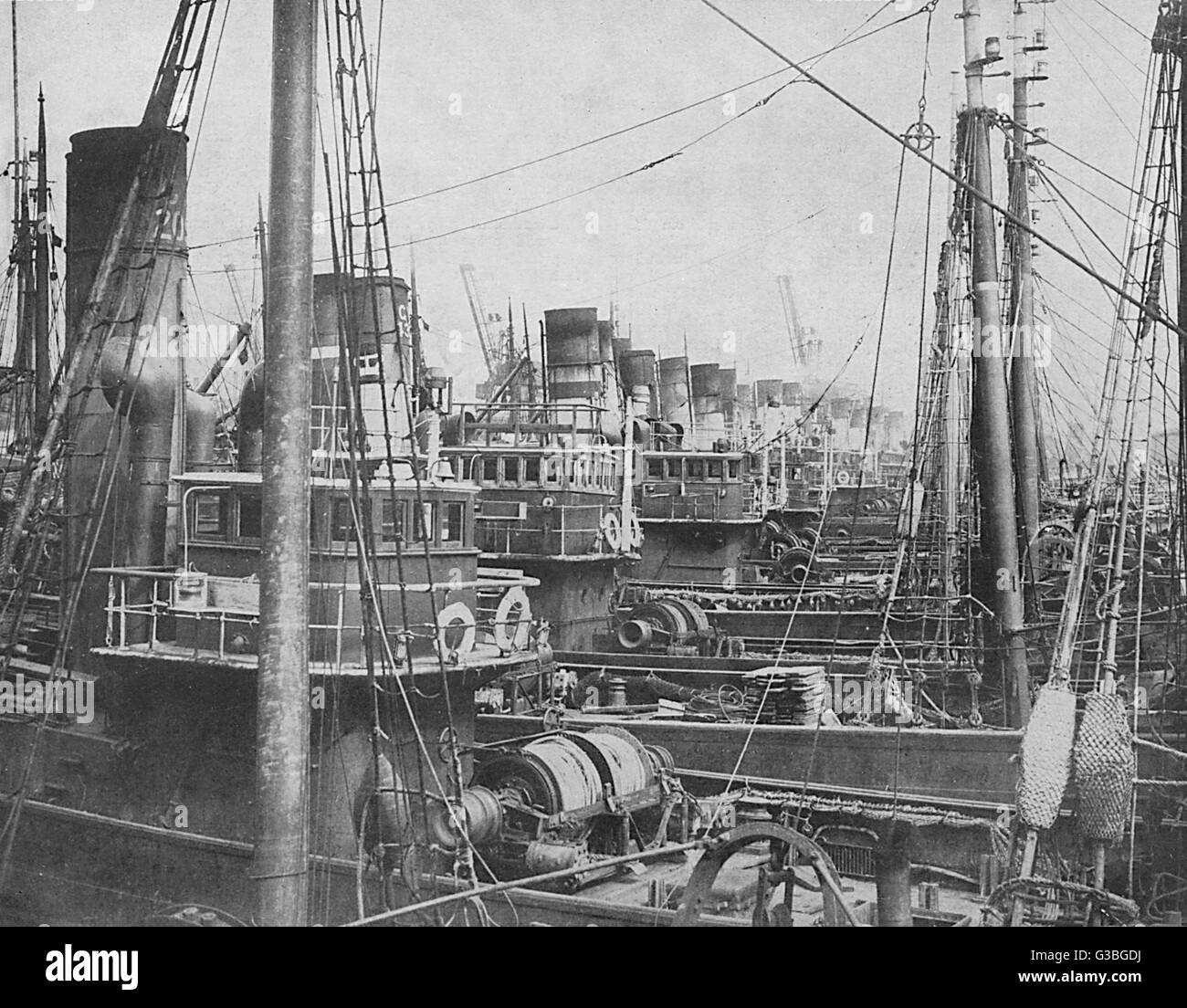 Fishing trawlers and liners   laid up at the Fleetwood docks,   owing to shortage of coal due  to the General Strike        Date: 1926 Stock Photo