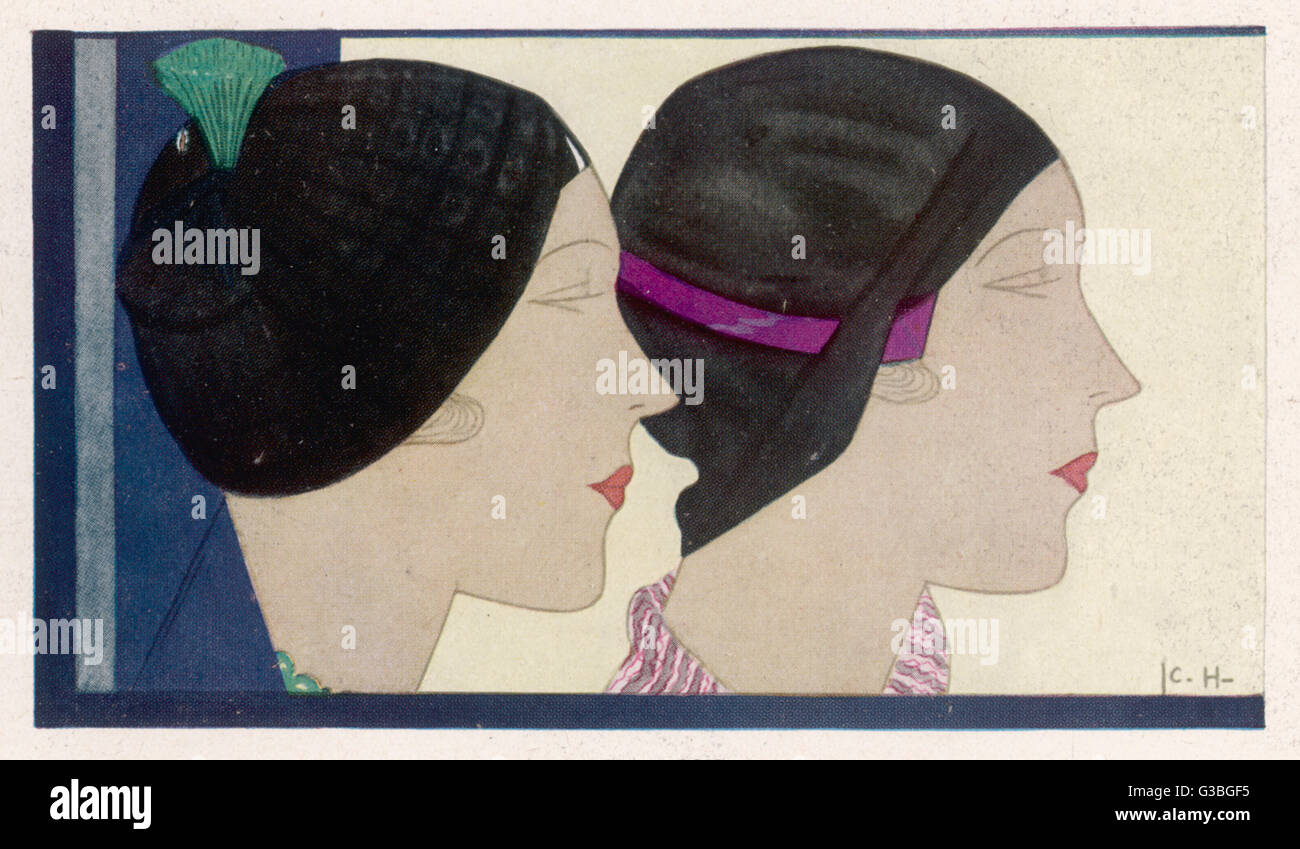 Two hats by Rose Valois  described as berets. Both are  close-fitting and brimless.        Date: 1930 Stock Photo