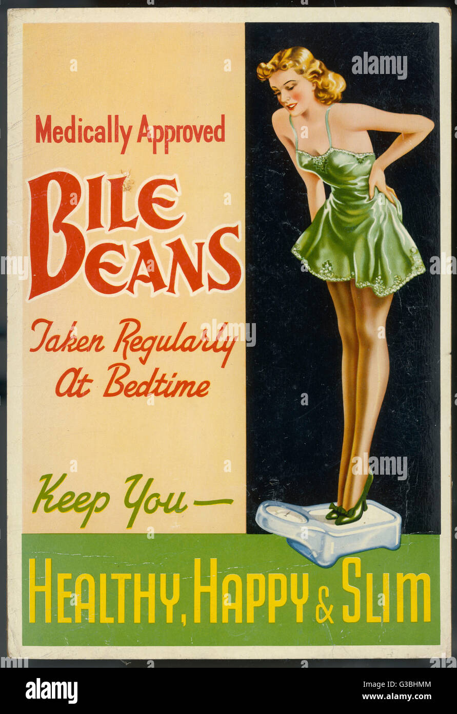 A lady in her slip weighs  herself and is delighted to  find that her bedtime treat of  Bile Beans (yuk !) is keeping  her healthy, happy and slim.      Date: 1940s Stock Photo