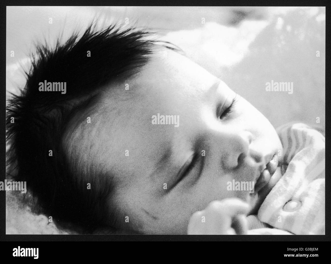 Babies sleep photographs Black and White Stock Photos & Images Alamy