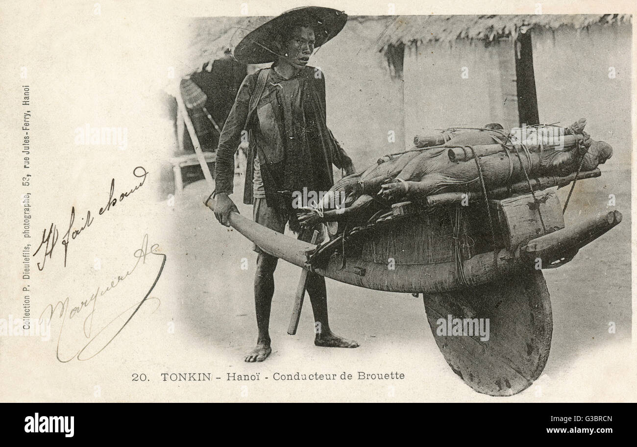 Hanoi Vietnam Wheelbarrow driver Stock Photo Alamy