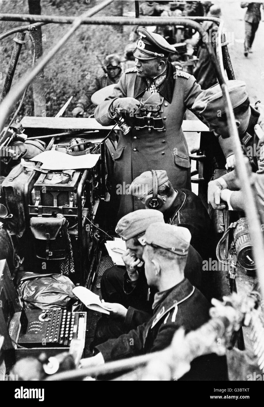 General Heinz Guderian in his armoured half-track command vehicle. To the lower left of the picture is his Enigma coding machine.     Date: 1941 Stock Photo
