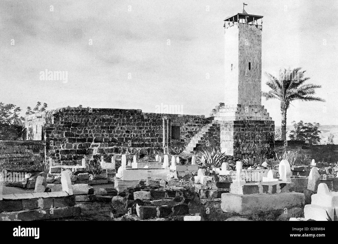 View of the mosque and cemetery at Beisan (Beit She'an, Beesan, Bisan), Holy Land, at the junction of the Jordan River Valley and the Jezreel Valley.      Date: 1920s Stock Photo