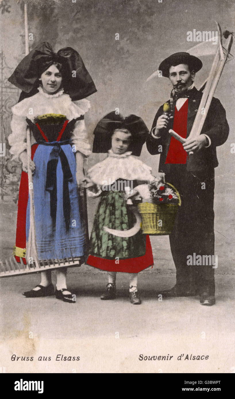 Folk in the traditional costume of Alsace Lorraine Date circa Stock
