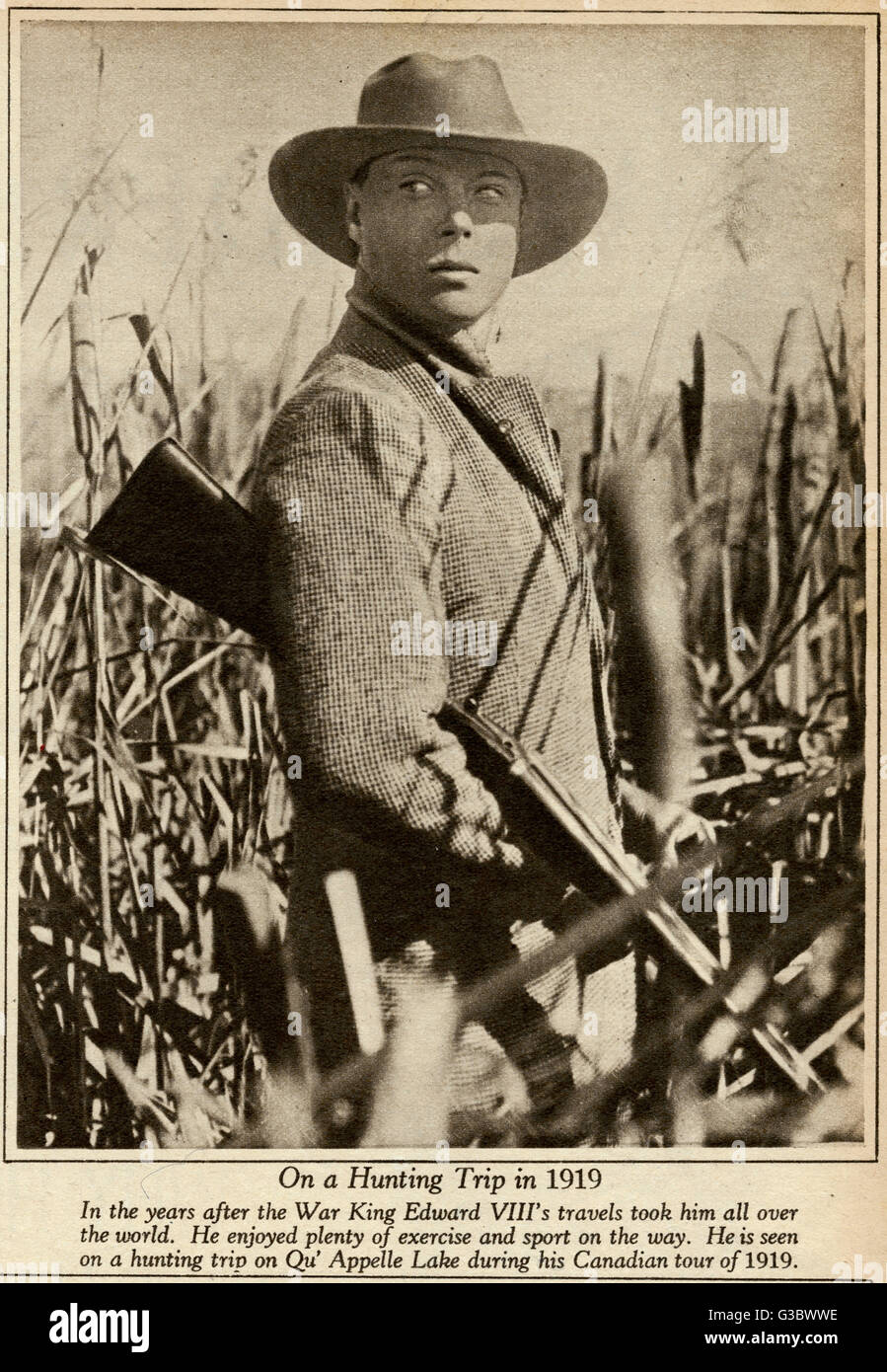 Edward Prince of Wales, later King Edward VIII, and then Duke of Windsor, photographed holding a gun, on a hunting trip on Qu' Appelle Lake during his Canadian tour.      Date: 1919 Stock Photo