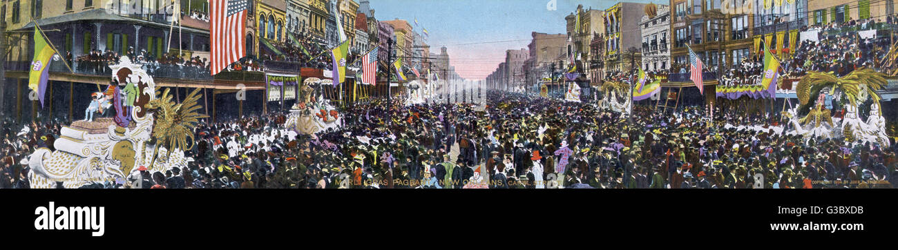 Mardi Gras Pageant taking place in Canal Street, New Orleans, Louisiana, USA.       Date: 1904 Stock Photo