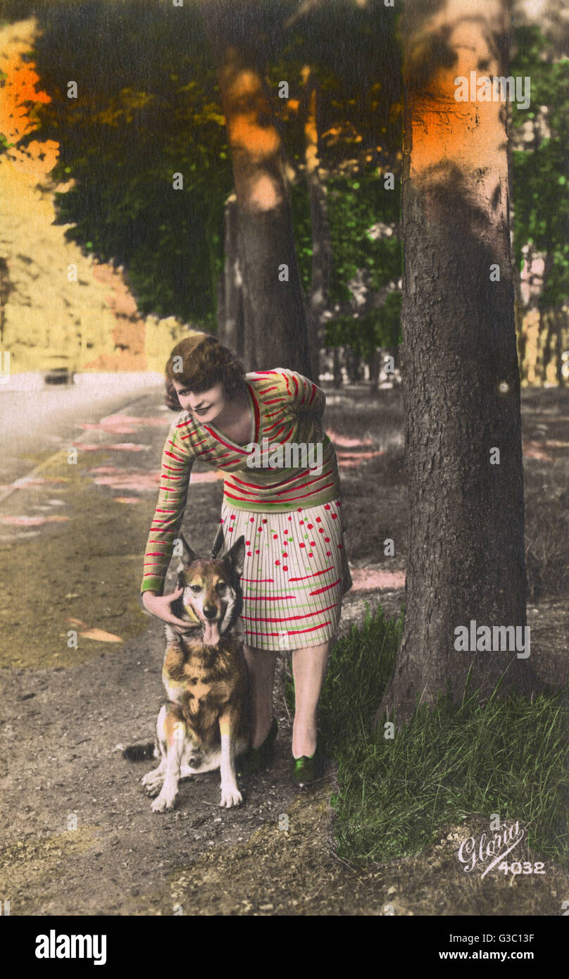 Young woman with a German Shepherd dog, France Stock Photo