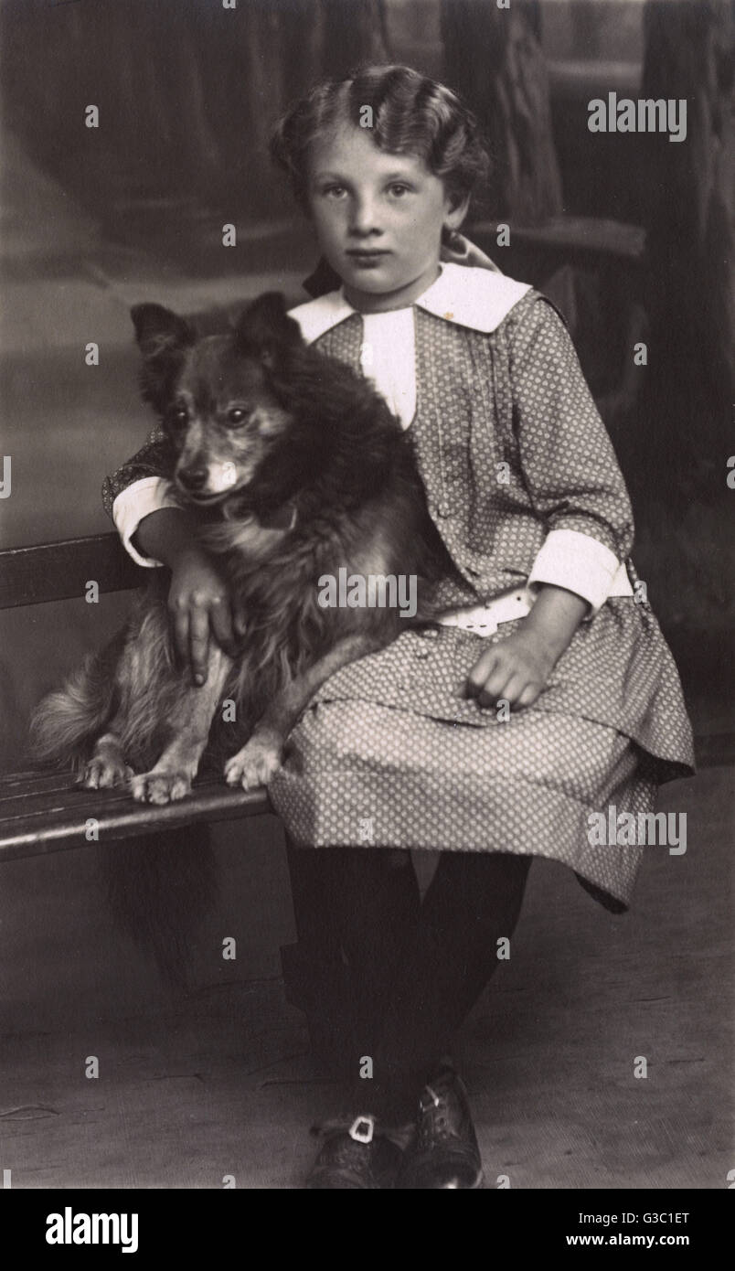 Studio portrait, little girl with a dog, Germany Stock Photo - Alamy