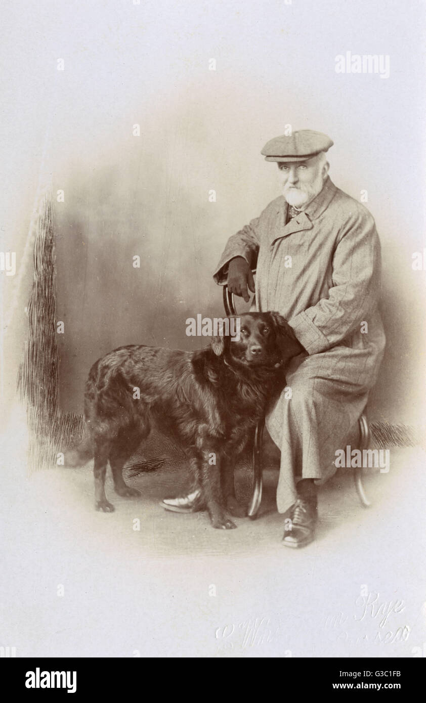 Studio portrait, elderly man with his dog Stock Photo