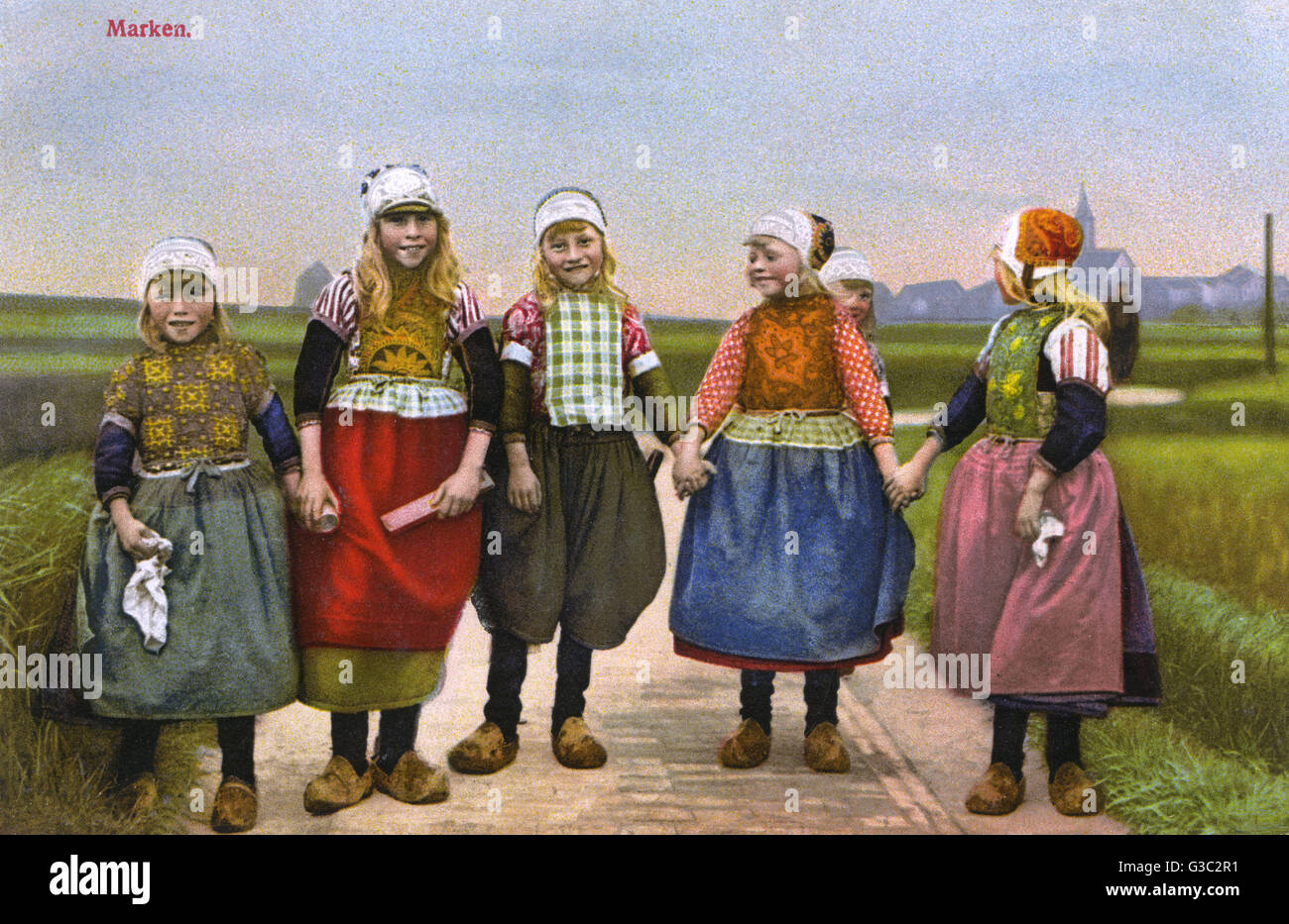 Five jolly Dutch Country Girls - Marken, The Netherlands Stock Photo