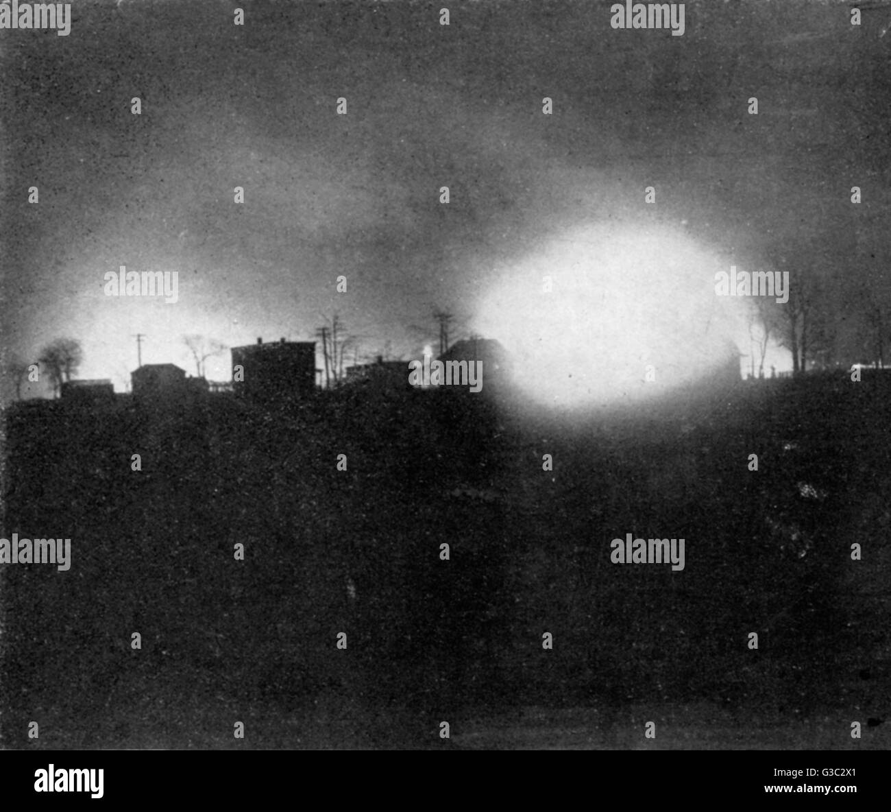 What an Explosion at a Munitions Factory looks like - a photograph included in a feature discussing the blast at the Silvertown Munitions Factory in East Lonon on 19th January 1917. This explosion illustrated occured at the Canadian Car and Foundry Compan Stock Photo