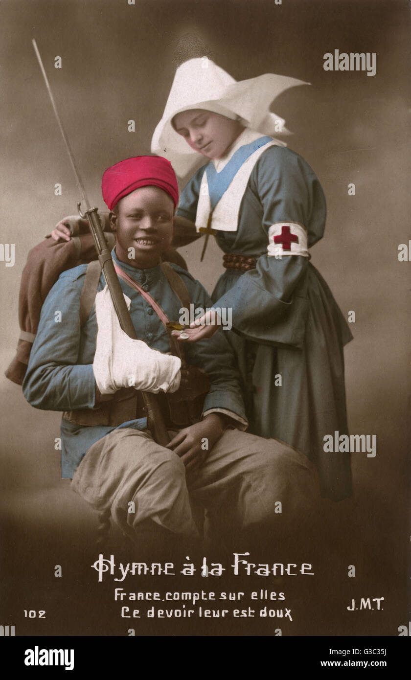 Injured colonial French Soldier (WW1) cared for by nurse Stock Photo