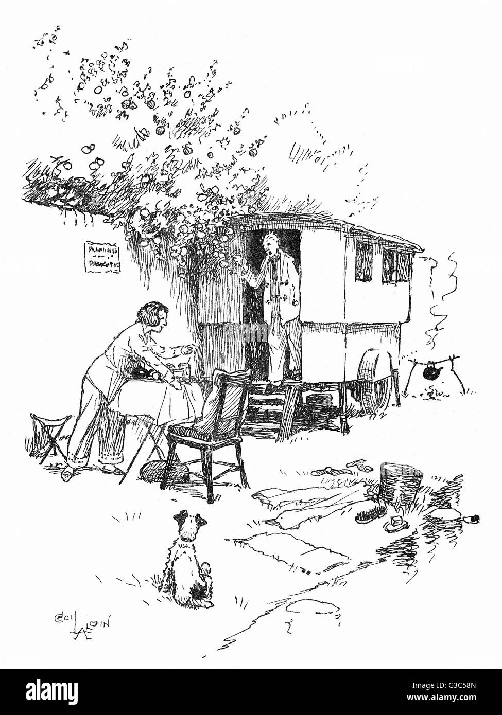 Caravanning scene with couple and dog.  Choose your place preferably where a large fruit tree hangs over the wall.      Date: 1932 Stock Photo