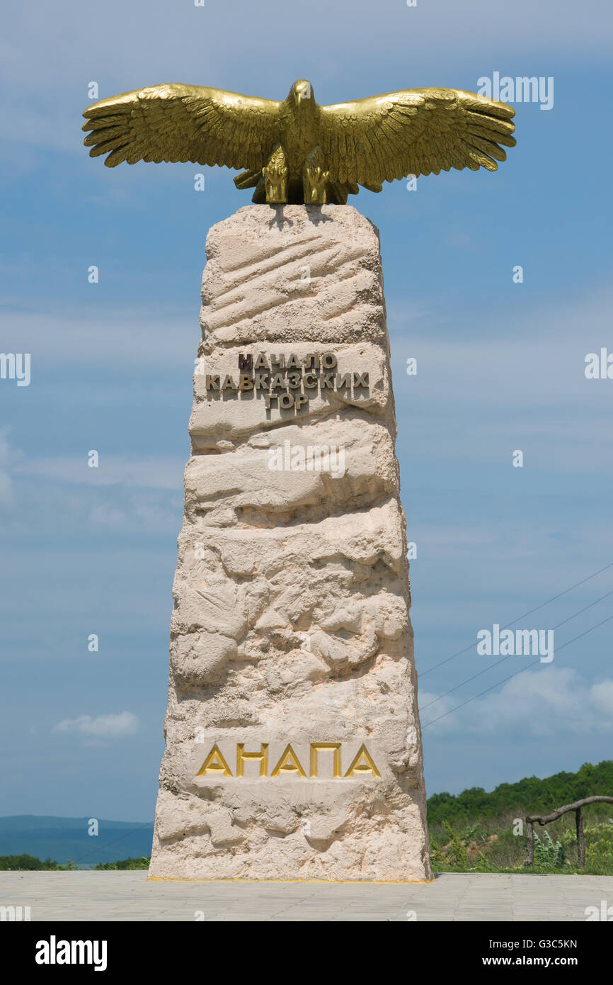 Anapa, Russia - May 13, 2016: Monument stele 'Soaring Eagle' with the word beginning of the Caucasian mountains set in the subur Stock Photo