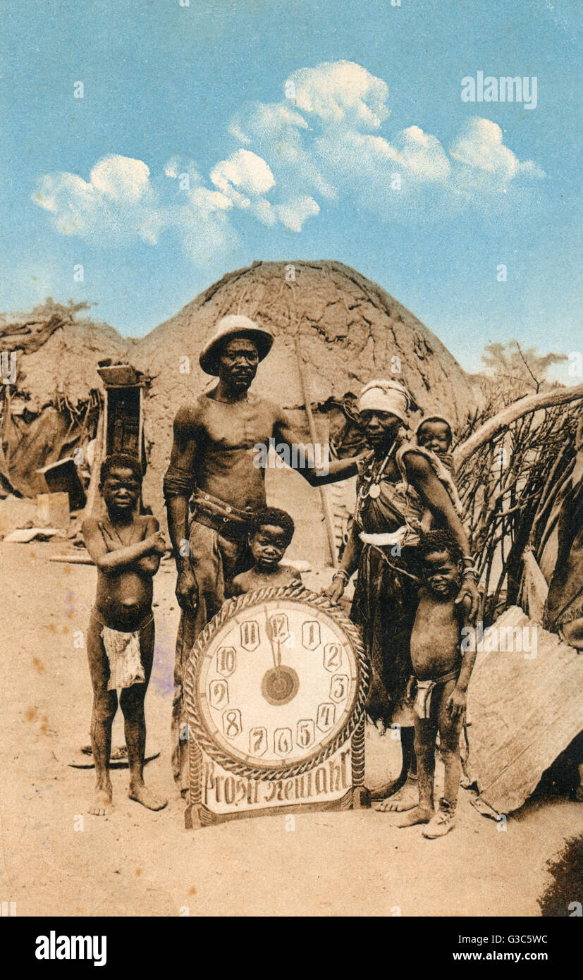 Natives with clock, Swakopmund, south west Africa Stock Photo Alamy