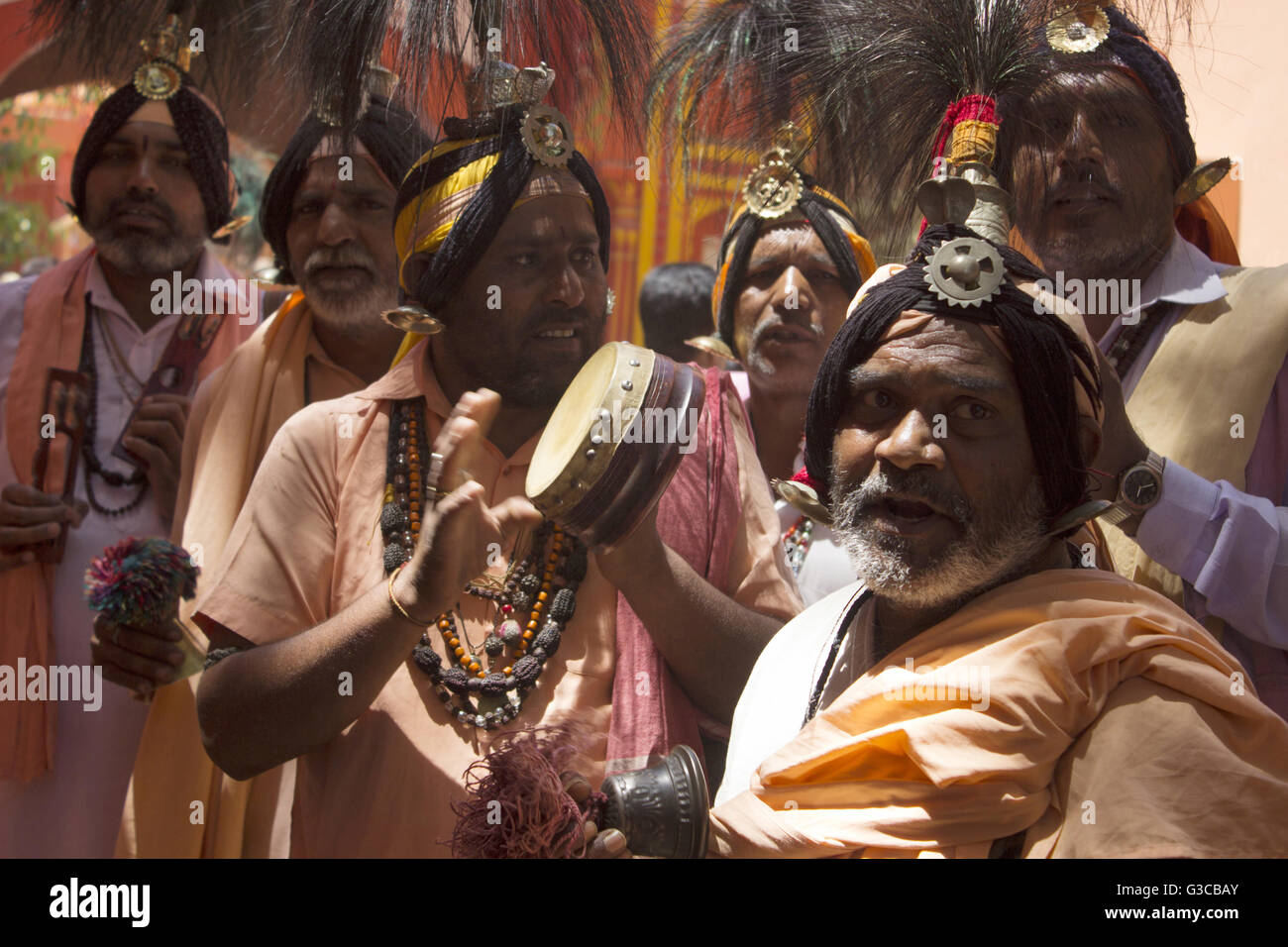 Sadhu playing damaru or drum. Kumbh Mela 2016. Ujjain, Madhya Pradesh, India Stock Photo