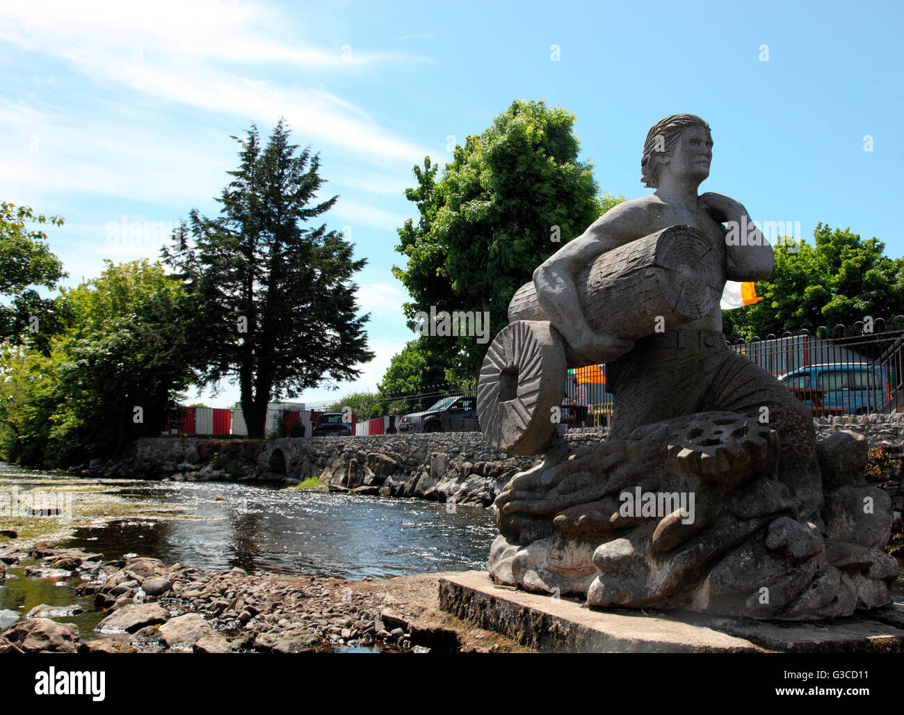The Miller Returns, sculpture by Shane Gilmore in the O'Garney River in Sixmilebridge, Co. Clare Stock Photo