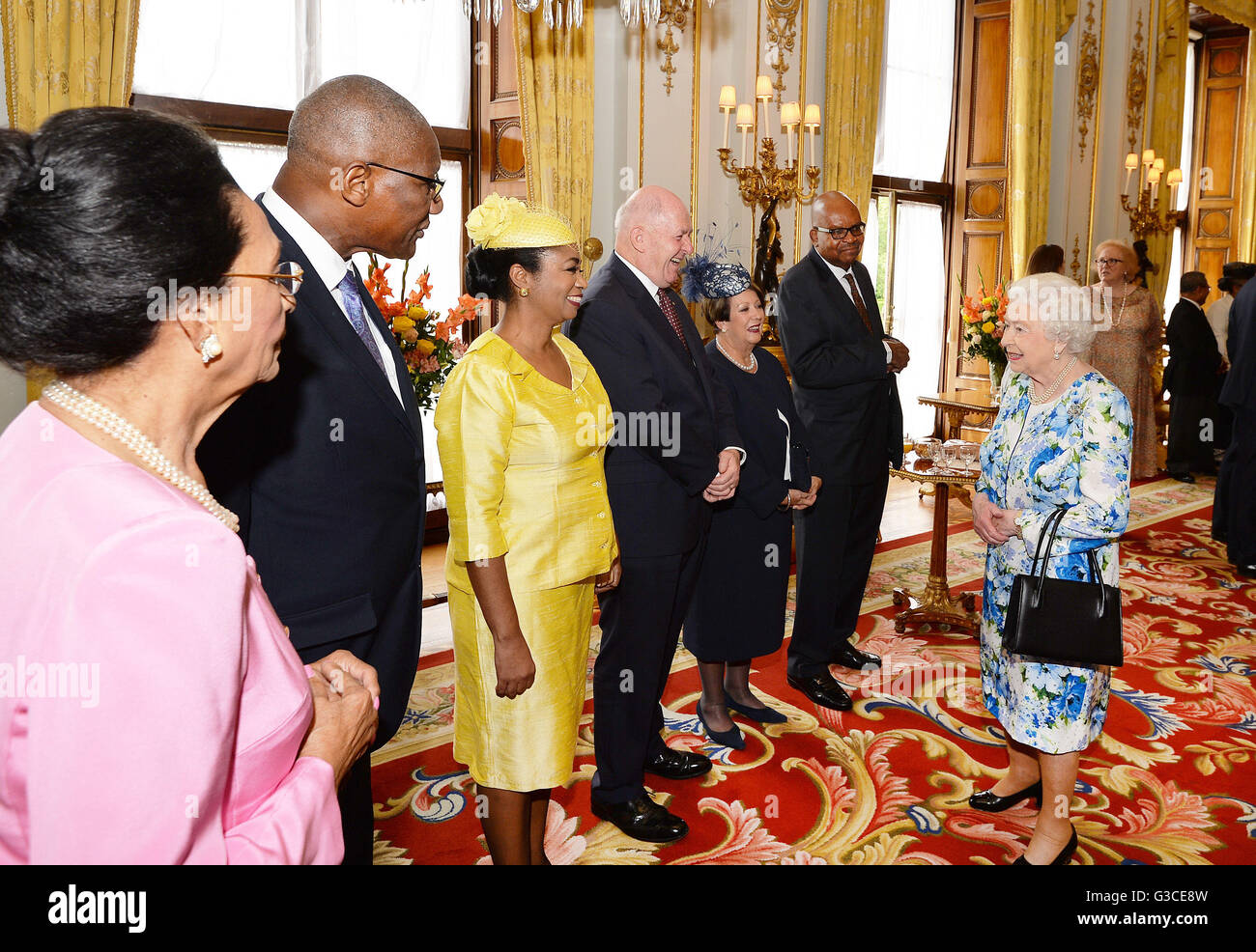Queen Elizabeth II meets guests during a reception ahead of the Governor General's lunch at Buckingham Palace in London. Stock Photo