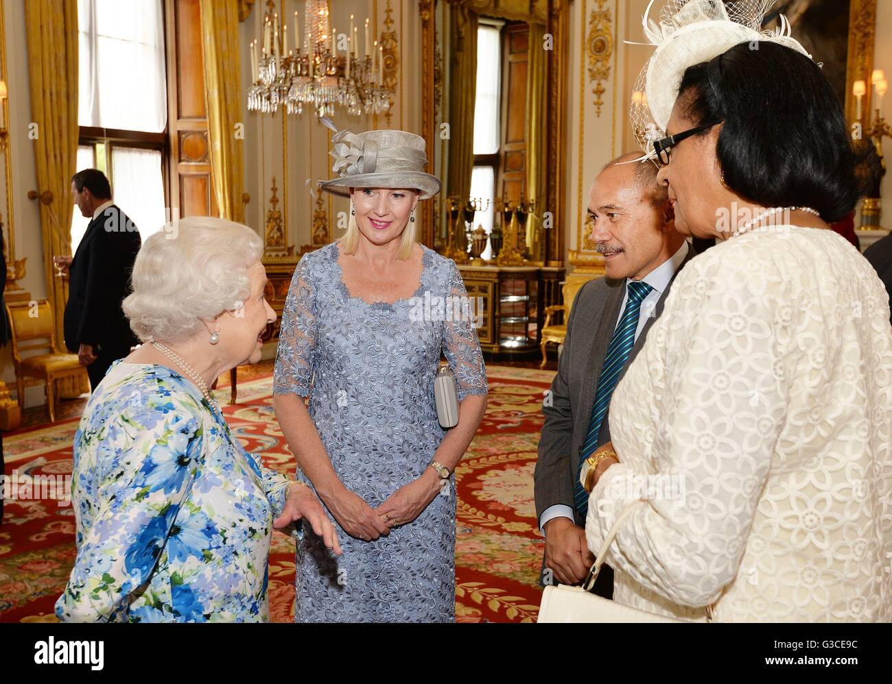 Queen Elizabeth II talks to Sir Jerry Mateparae of New Zealand and Dame Cecile La Grande (right) of Grenada, during a reception ahead of the Governor General's lunch at Buckingham Palace in London. Stock Photo