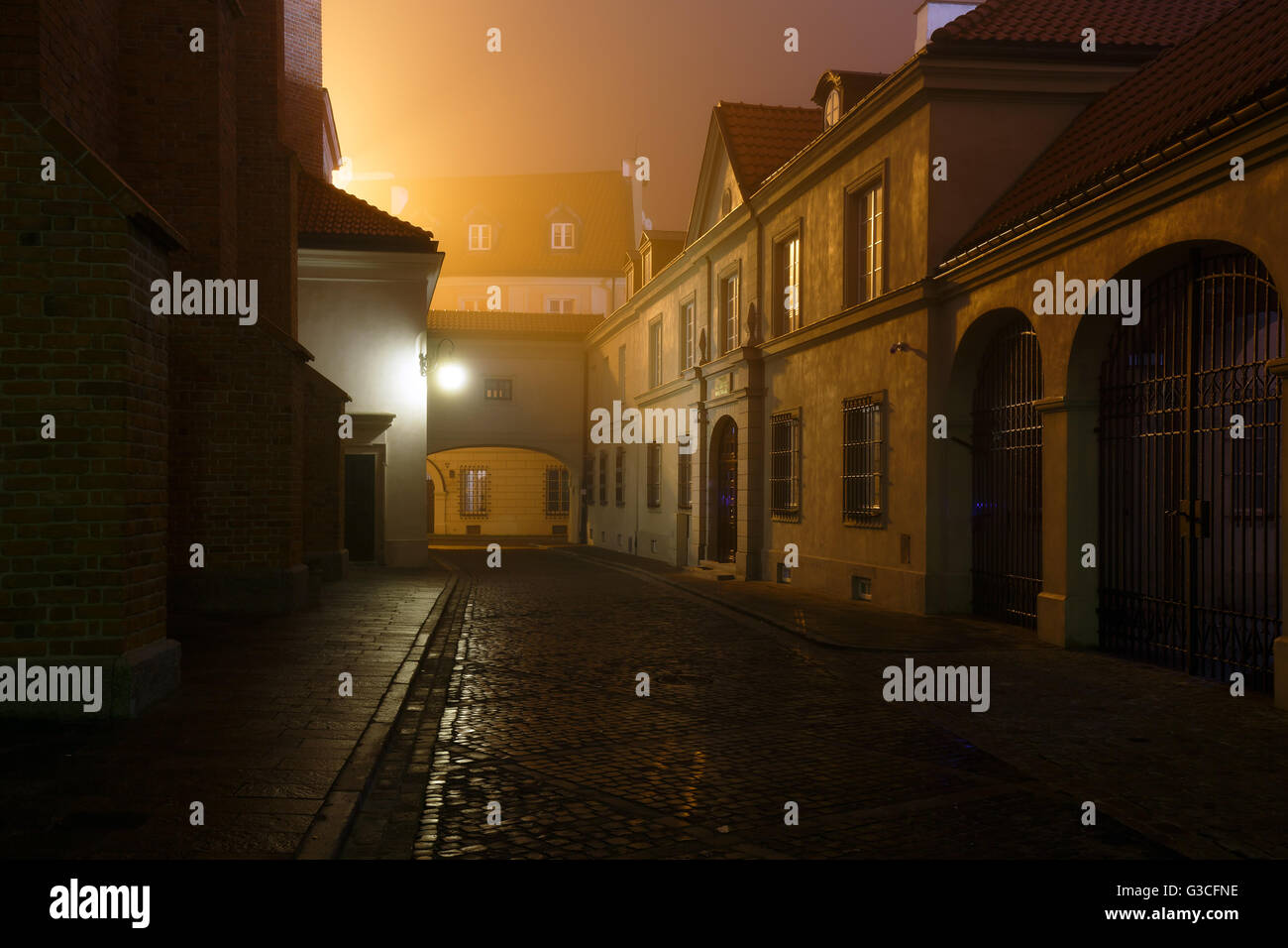 Street of the old city in Warsaw at night Stock Photo