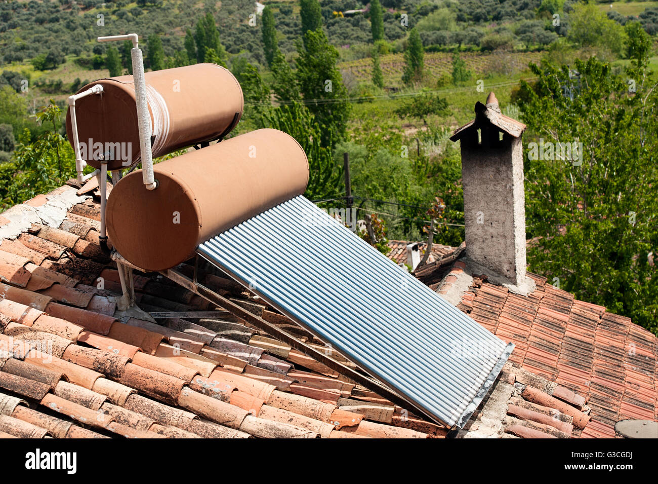 Solar water heater on the roof Stock Photo