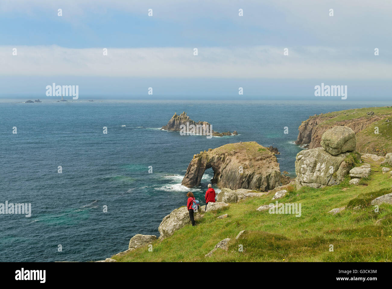 View to the rock arch Eny's Dodnan Arch, Armed Knight rock, Cornwall, Southern England, Great Britain Stock Photo