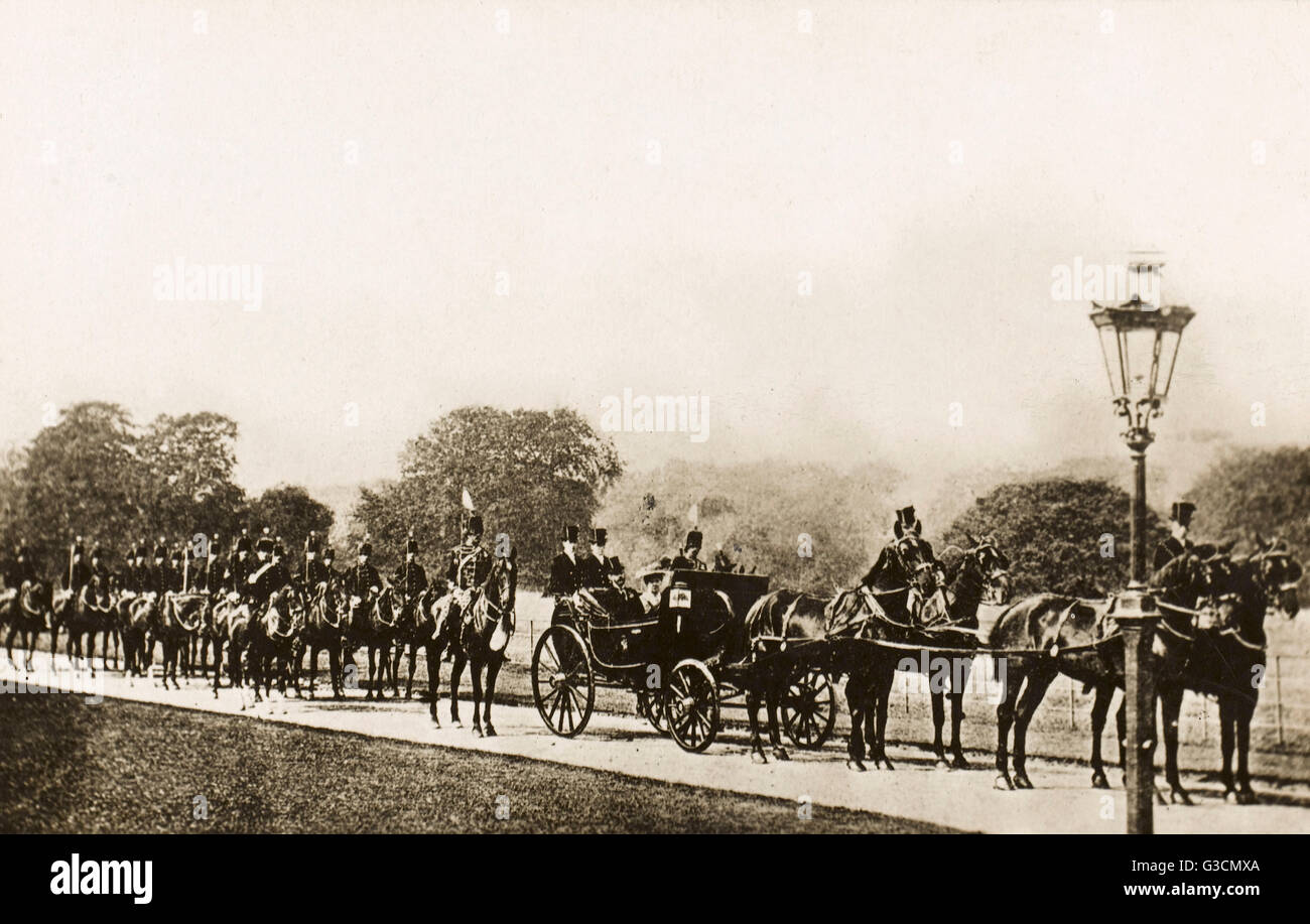 King George V and mounted honour guard - Windsor Great Park Stock Photo