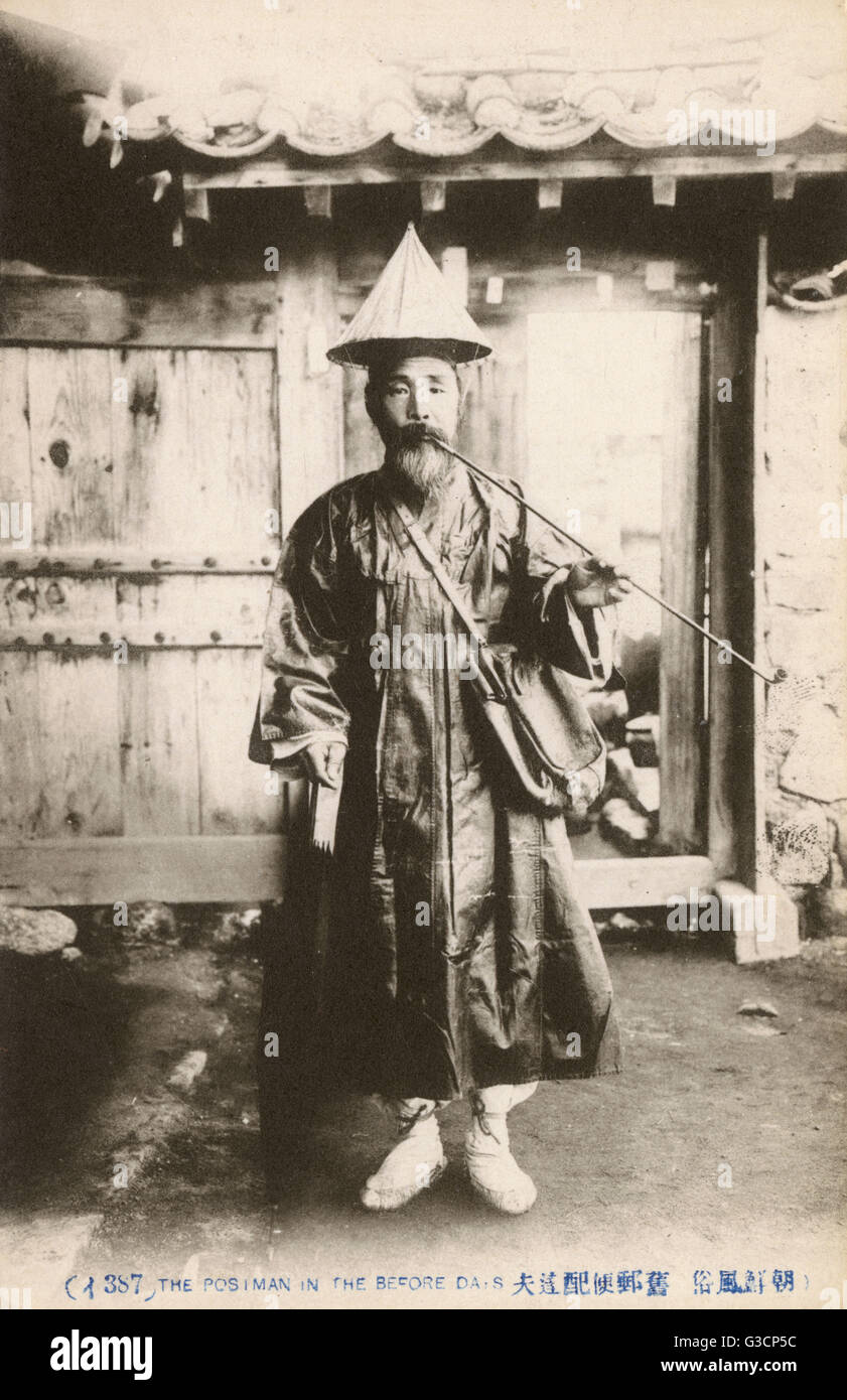 Old Chinese Postman in Traditional attire Stock Photo - Alamy