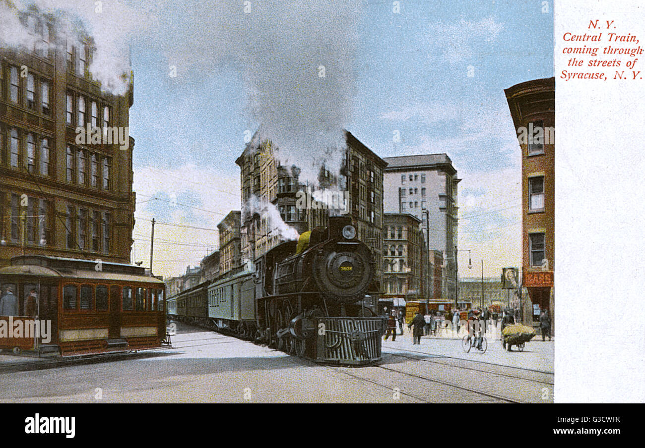 New York Central train making its was through a street, Syracuse, New