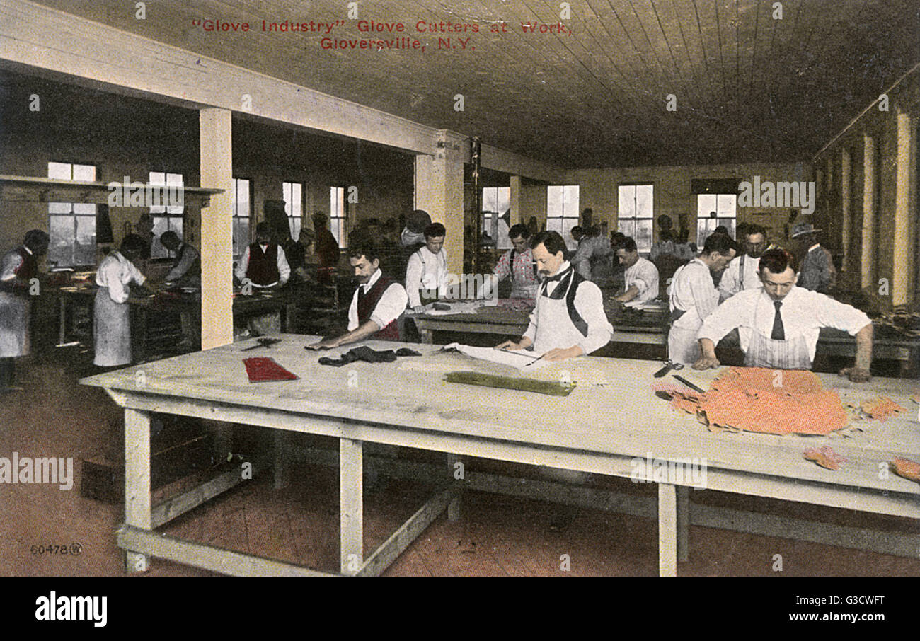 Glove cutters at work in Gloversville, New York State, USA.      Date: circa 1913 Stock Photo