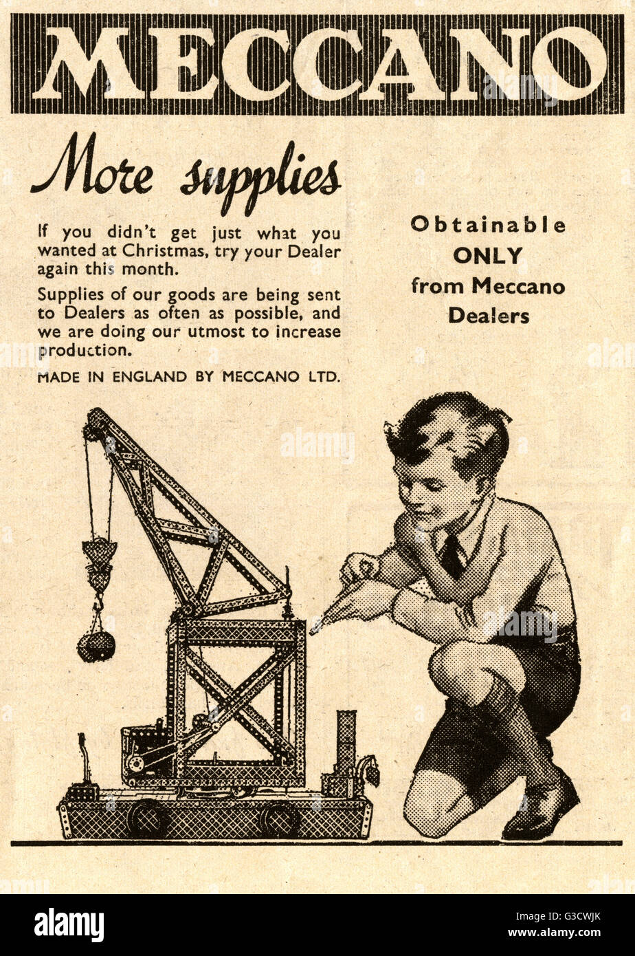 Meccano Advertisement - Young lad and his impressive crane Stock Photo