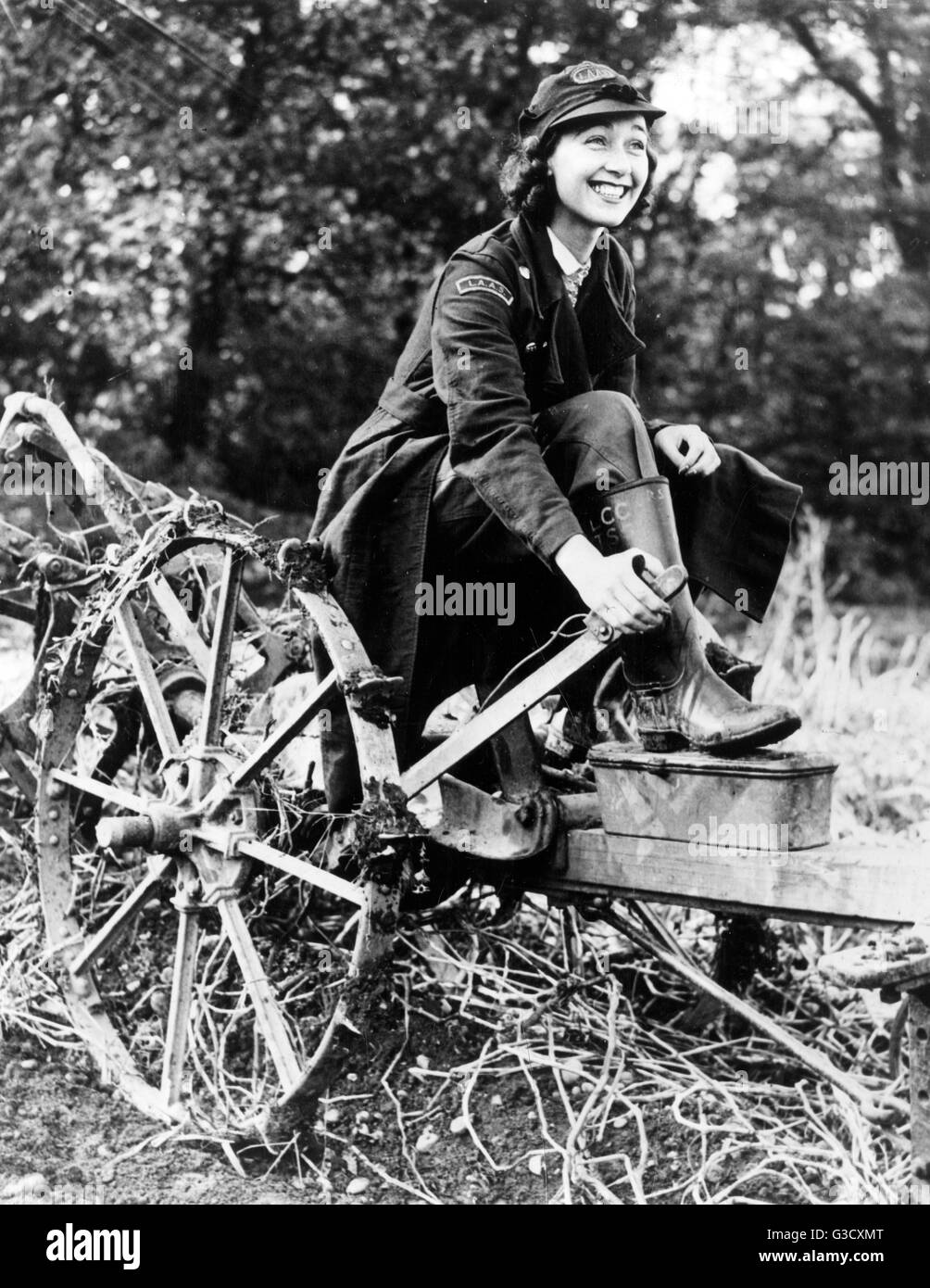 WW2 - London Auxiliary Ambulance Service Driver on the farm Stock Photo