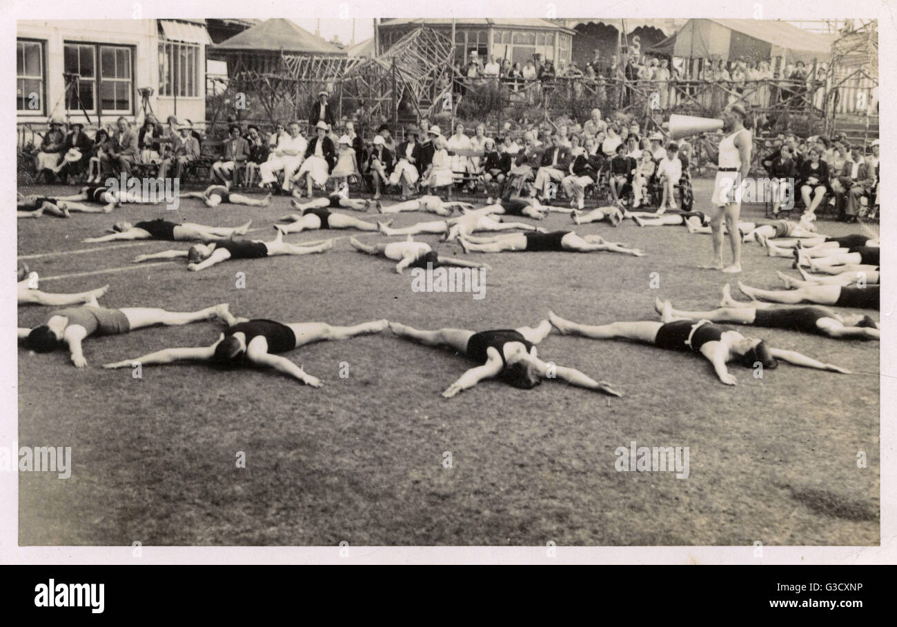 British Gymnastics Display with announcer & seated audience! Stock Photo