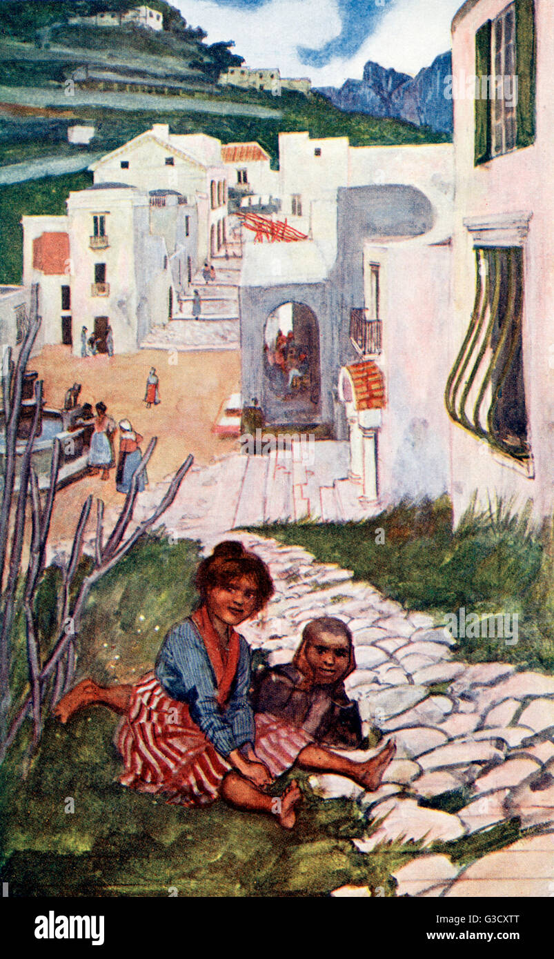 Children sitting in a street in Ravello, Italy Stock Photo