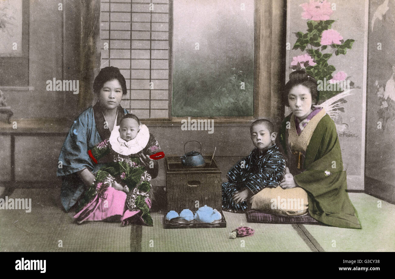 Japan - Japanese Women pose for a photograph with babies Stock Photo