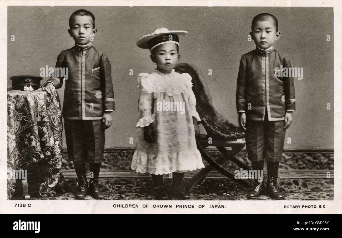 The Children of the Crown Prince of Japan. From left: Their Imperial Highnesses Prince Hirohito (1901-1989), Prince Nobuhito (1905-1987) and Prince Yasuhito (1902-1953) of Japan. It would appear that the traditional dress for a young child (regardless of Stock Photo