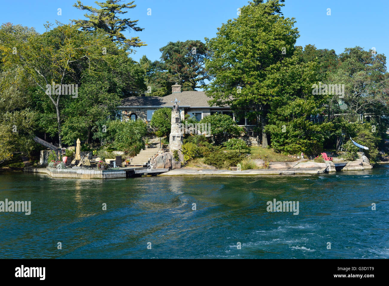 Kingston, Canada - September 23, 2015: One Island in Thousand Islands Region in summer in Kingston, Ontario, Canada Stock Photo