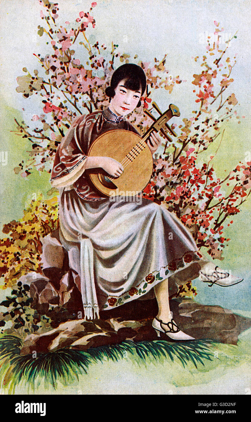 Chinese woman playing a Ruan Stock Photo