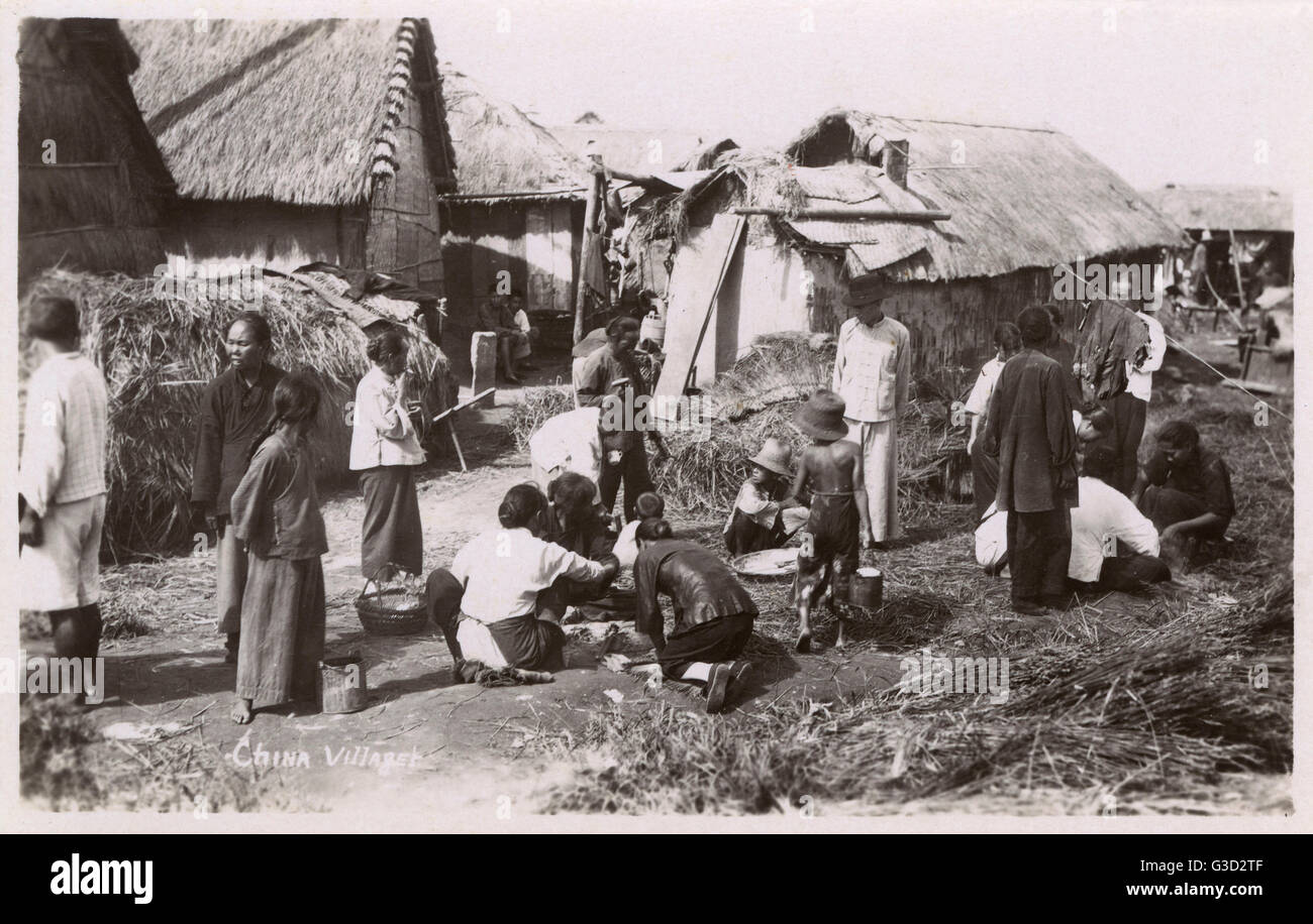 Chinese Village Scene with Villagers. Date: circa 1930s Stock Photo - Alamy